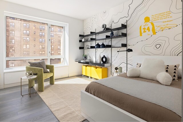 545 W 110th St Unit 6Eg, New York City, NY 10025 - bedroom featuring wood finished floors and baseboards