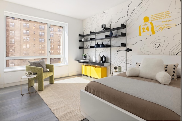 545 W 110th St Unit 6Eg, New York City, NY 10025 - bedroom with wood finished floors and baseboards