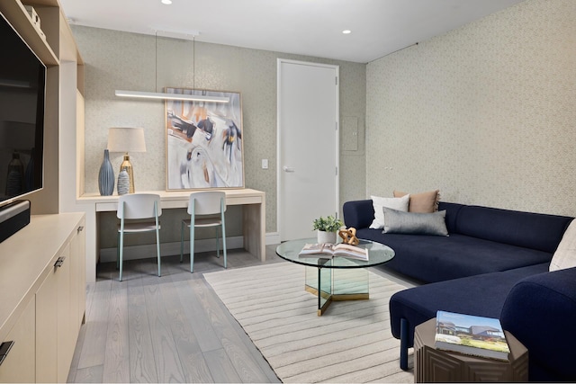 545 W 110th St Unit 6Eg, New York City, NY 10025 - living area with wood finished floors, wallpapered walls, an office area, and recessed lighting