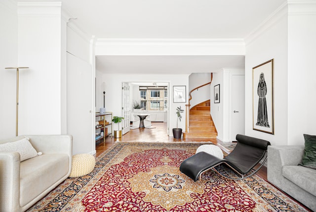 2373 Broadway Unit 1905, New York City, NY 10024 - living room with wood finished floors, stairs, and crown molding