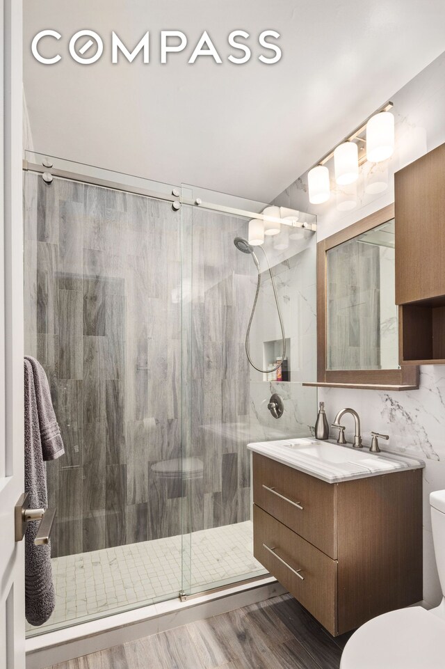 159 W 53rd St Unit 34E, New York City, NY 10019 - corridor with light wood-type flooring and baseboards