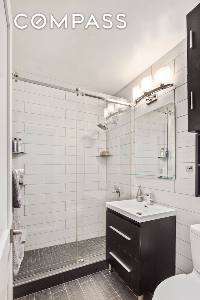159 W 53rd St Unit 34E, New York City, NY 10019 - bedroom featuring light wood-style flooring and radiator heating unit