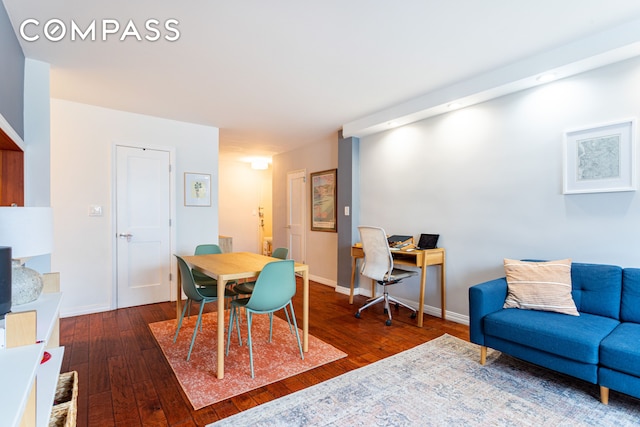 191 Willoughby St Unit 8J, New York City, NY 11201 - dining room with wood-type flooring, an office area, and baseboards