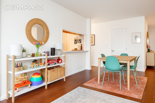 191 Willoughby St Unit 8J, New York City, NY 11201 - dining space featuring hardwood / wood-style flooring and baseboards