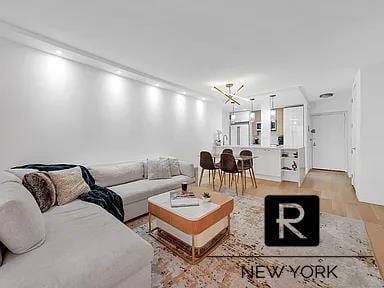 living area featuring recessed lighting