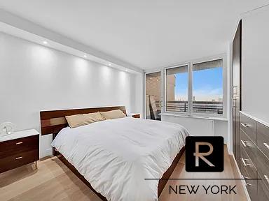 bedroom featuring light wood-style flooring and recessed lighting