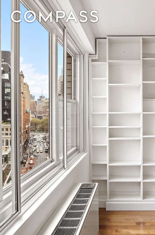 70 E 10th St Unit 14P, New York City, NY 10003 - spacious closet featuring wood finished floors