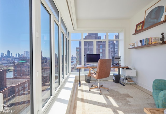 office space featuring a skyline view