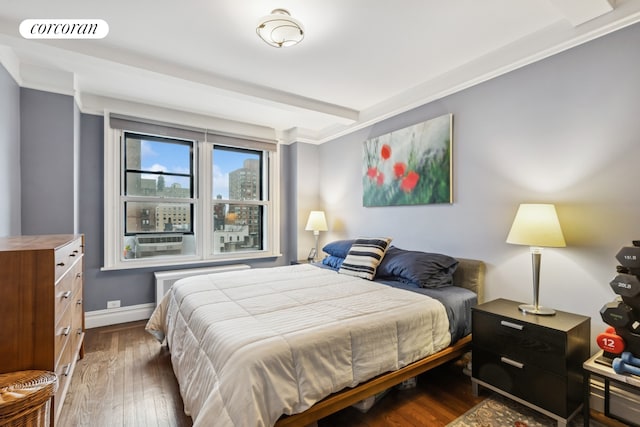 175 W 93rd St Unit 9B, New York City, NY 10025 - bedroom featuring hardwood / wood-style flooring, beam ceiling, baseboards, and cooling unit