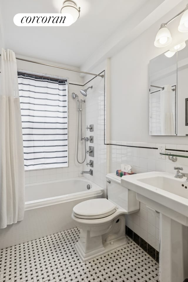 175 W 93rd St Unit 9B, New York City, NY 10025 - full bath with shower / tub combo, toilet, tile walls, and a sink