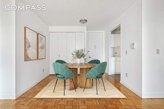 170 E 87th St Unit W15H, New York City, NY 10128 - dining room with baseboards