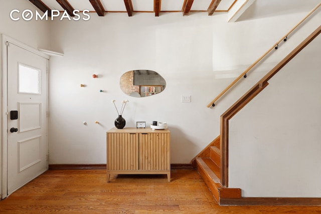 171 Monitor St, New York City, NY 11222 - foyer featuring light wood-style flooring and stairway