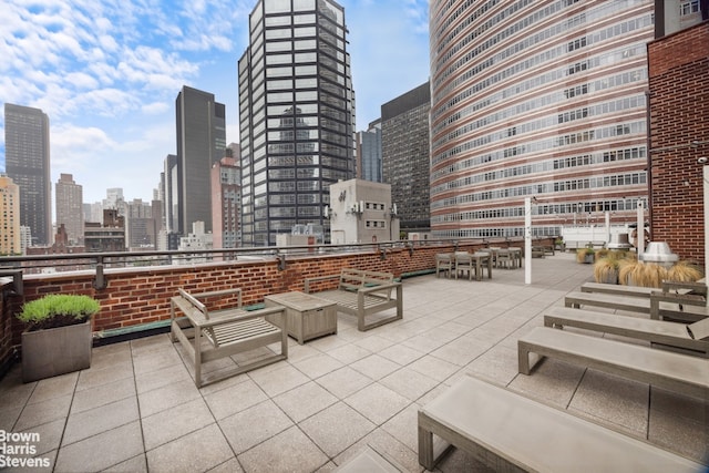 220 E 54th St Unit 8D, New York City, NY 10022 - view of patio / terrace with a skyline view