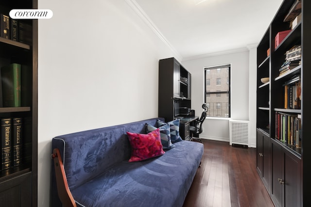living area featuring crown molding, dark wood-style flooring, and baseboards