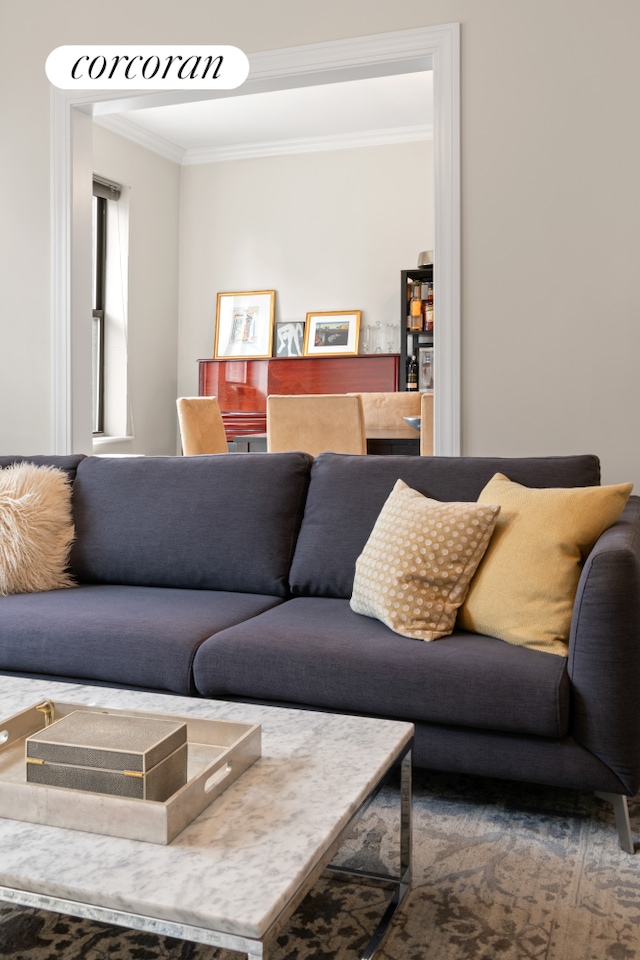 living room with crown molding