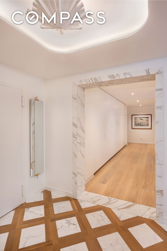 spare room with light wood-style floors
