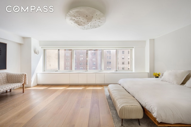 bedroom featuring wood finished floors
