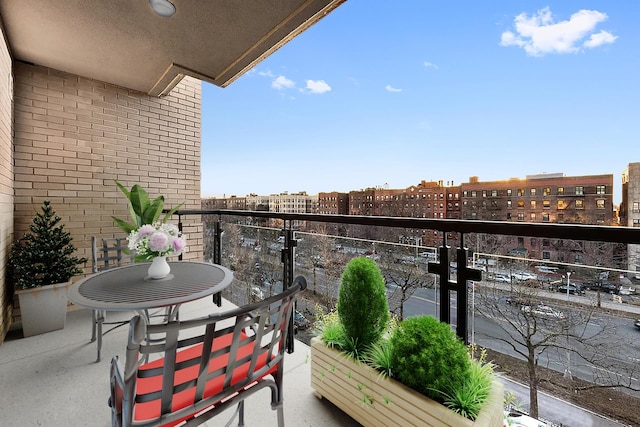 balcony featuring a city view