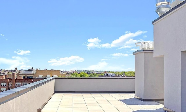 view of patio / terrace with a balcony