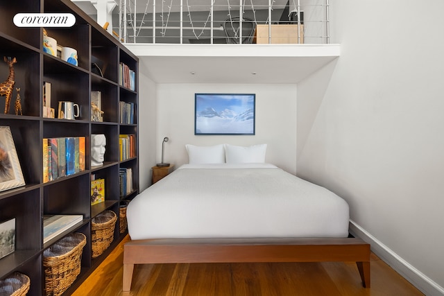 50 Bridge St Unit 501, New York City, NY 11201 - bedroom featuring wood finished floors and baseboards