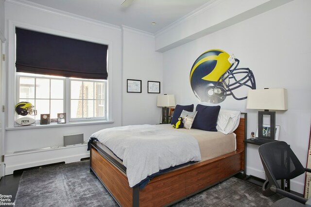 bedroom featuring crown molding