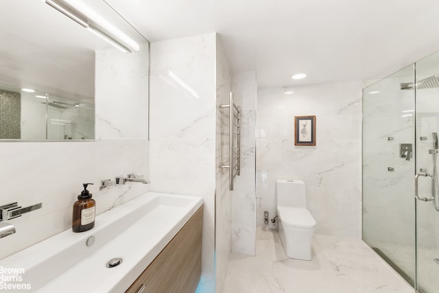 full bath with tile walls, a marble finish shower, marble finish floor, and toilet