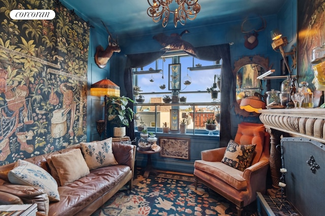 living area featuring a chandelier
