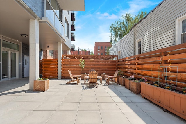 47-28 11th St Unit 6-C, New York City, NY 11101 - view of patio featuring fence