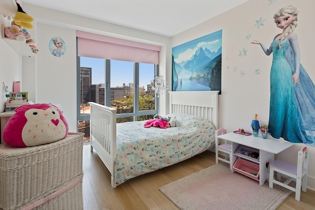 47-28 11th St Unit 6-C, New York City, NY 11101 - bedroom featuring wood finished floors