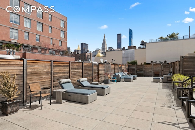 121 W 20th St Unit 2D, New York City, NY 10011 - view of patio with outdoor lounge area and a skyline view