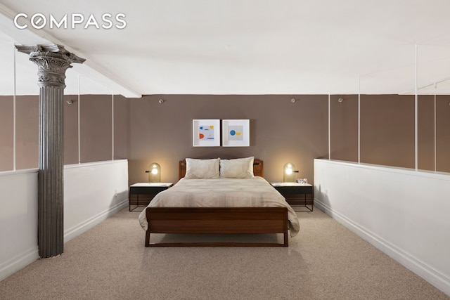bedroom featuring carpet floors and baseboards
