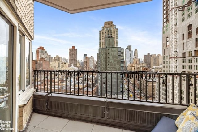 balcony featuring a city view