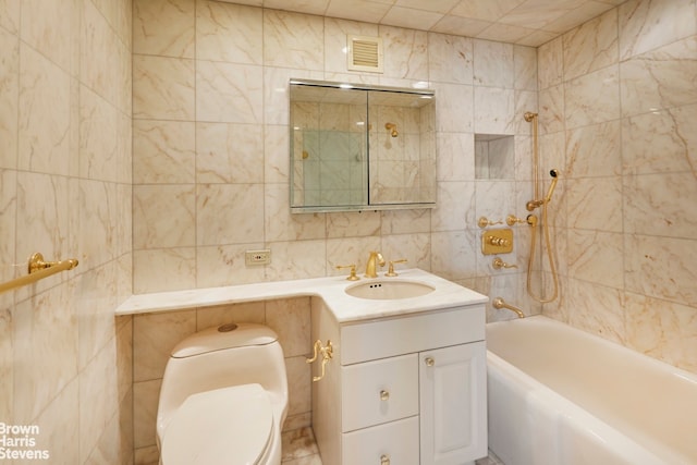 bathroom with tile walls, toilet, shower / bathing tub combination, vanity, and visible vents