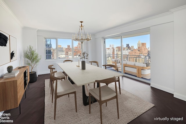 dining room with a view of city, crown molding, a chandelier, and dark wood-type flooring