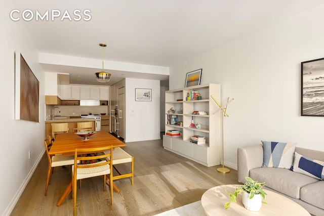 250 W 96th St Unit 11B, New York City, NY 10025 - dining room with light wood finished floors and baseboards