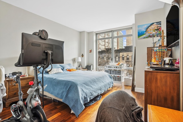 bedroom featuring wood finished floors