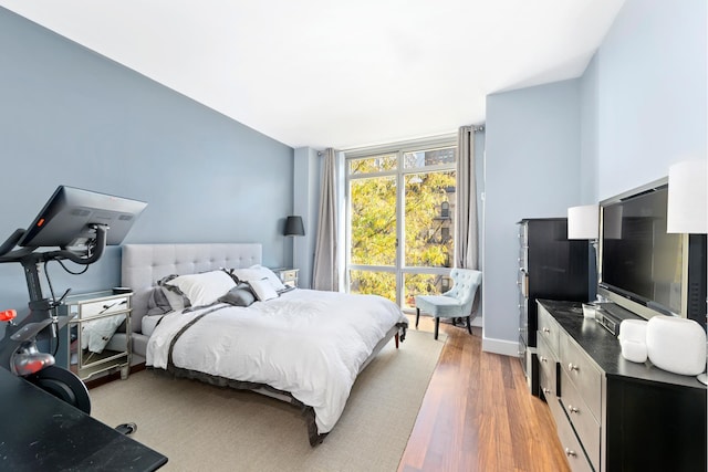 bedroom featuring light wood-type flooring