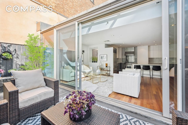 balcony with an outdoor hangout area