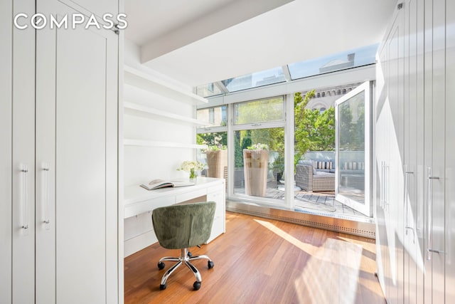 office space featuring wood finished floors