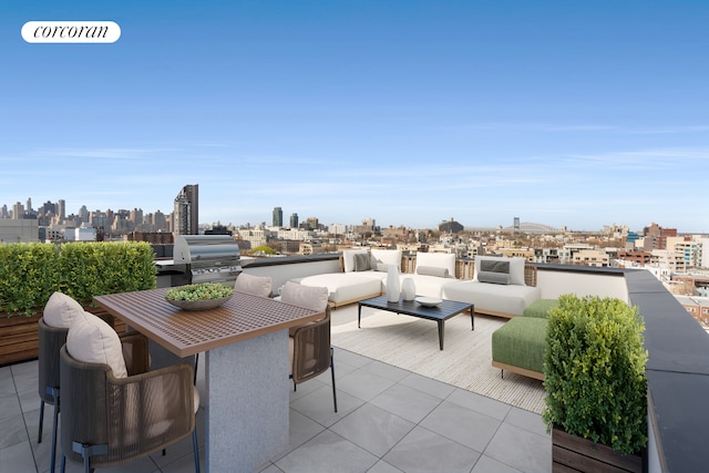 14-35 Broadway Unit 3A, New York City, NY 11106 - view of patio / terrace with a view of skyline, area for grilling, and an outdoor hangout area
