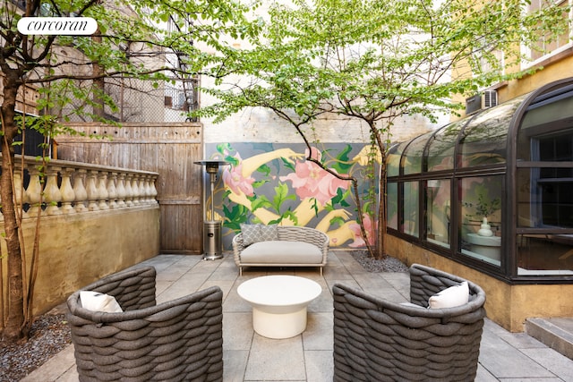 view of patio with fence