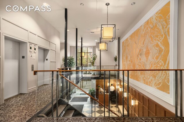 220 W 148th St Unit 3K, New York City, NY 10039 - stairs featuring elevator and baseboards