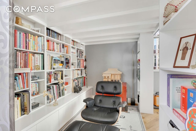 220 W 148th St Unit 3K, New York City, NY 10039 - sitting room featuring beamed ceiling and wood finished floors