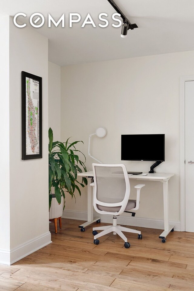 222 W 14th St Unit 3N, New York City, NY 10011 - home office with wood finished floors and baseboards