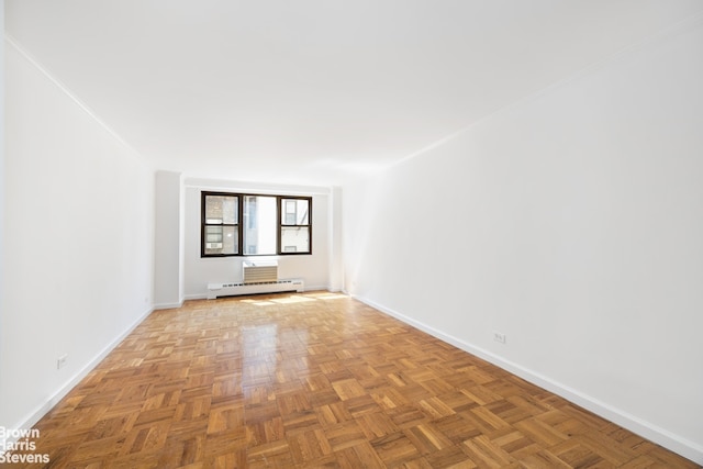 230 E 15th St Unit 5J, New York City, NY 10003 - empty room with a baseboard radiator and baseboards