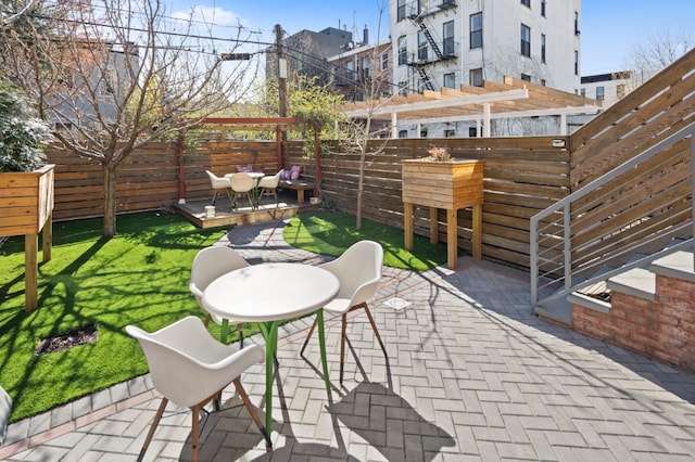 41 Wolcott Street House, New York City, NY 11231 - view of patio with fence, a deck, and a pergola