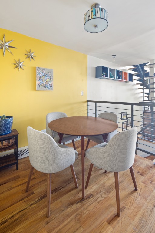 41 Wolcott Street House, New York City, NY 11231 - dining room featuring wood finished floors and baseboards