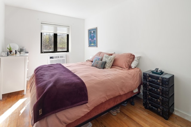 41 Wolcott Street House, New York City, NY 11231 - bedroom featuring wood finished floors and a wall mounted AC