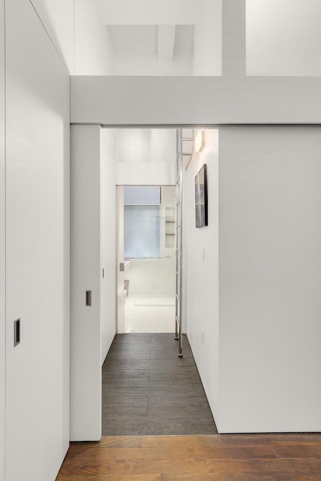 235 E 49th St Unit 1H, New York City, NY 10017 - hall with wood finished floors