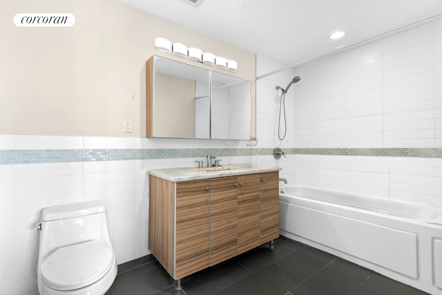 1138 Ocean Ave Unit 7G, New York City, NY 11230 - bathroom featuring tile patterned flooring, shower / bathing tub combination, vanity, and tile walls